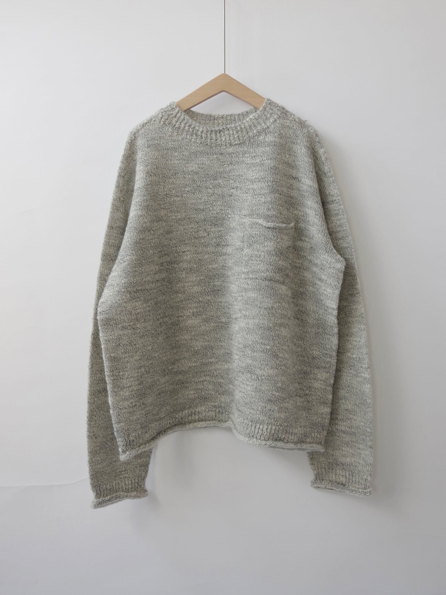 ランダムスラブウール 5Gホールガーメントシンプルポケットプルオーバー | Hands of creation