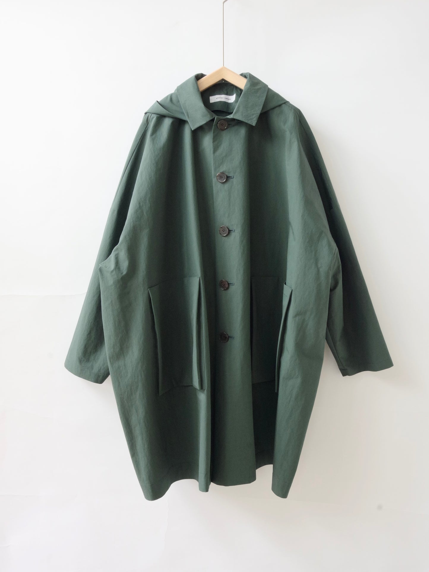 コットンナイロンタフタフーデットコート | atelier naruse