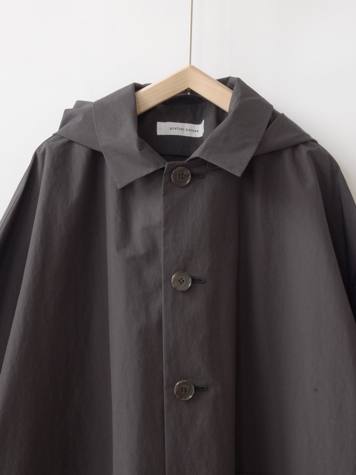 コットンナイロンタフタフーデットコート | atelier naruse